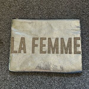 Silver pouch, ideal for beauty products and more. Never used